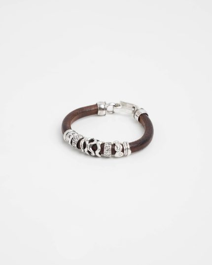 Pulsera plata y cuero Siete piezas