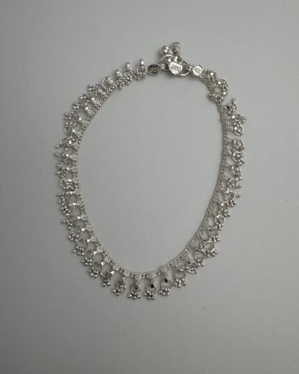 Tobillera plata y colgantes